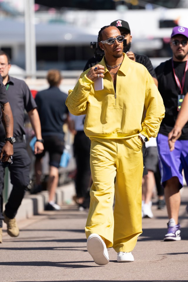 Lewis Hamilton arrived in a yellow outfit