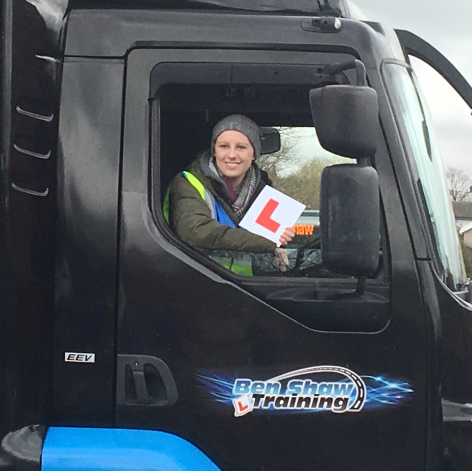 Laura tried out driving a lorry, bus, crane, a tractor, a tank and a digger