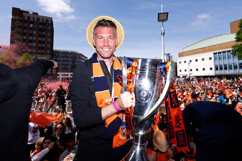 Luton Town manager Rob Edwards celebrates the club’s promotion in the city centre