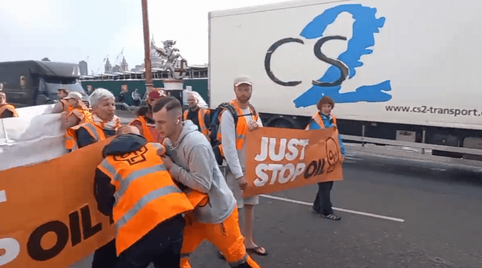 The moment a frustrated motorist drags Just Stop Oil protesters out of the road