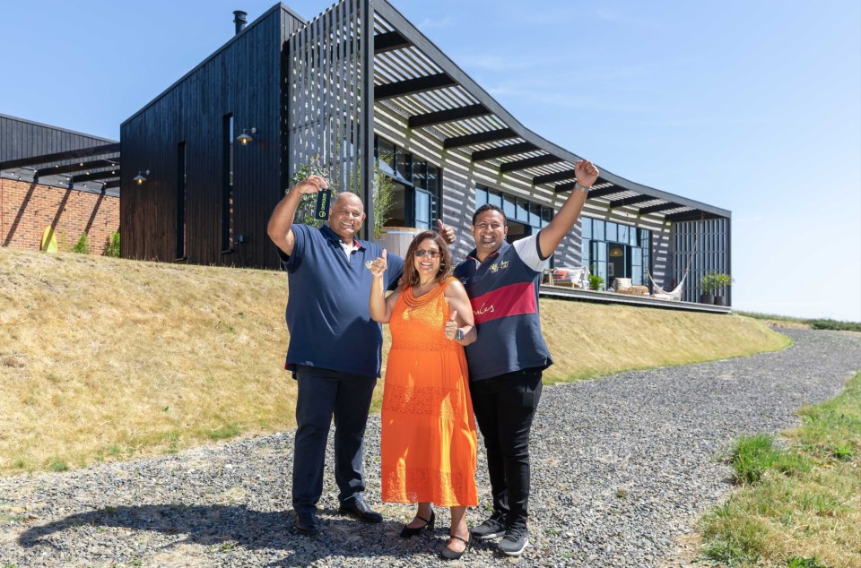 Uttam Parmar with his wife Raki and Son Aaron outside the Cornish mansion