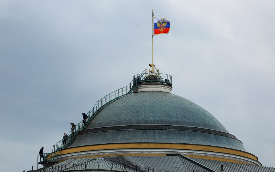 Workers were spotted on the dome of the Senate Palace building in the Kremlin