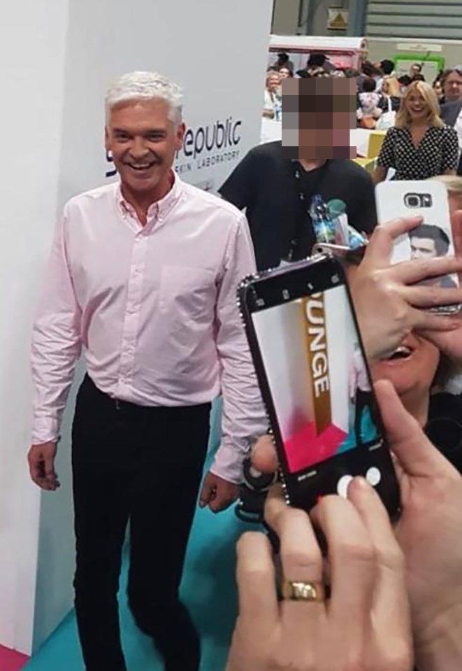 Phillip Schofield and Holly Willoughby were pictured with the young male aide at the centre of his affair scandal as early as 2018