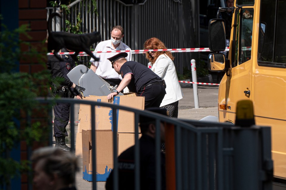 Authorities collect the debris of a Ukrainian drone after the attack in Moscow