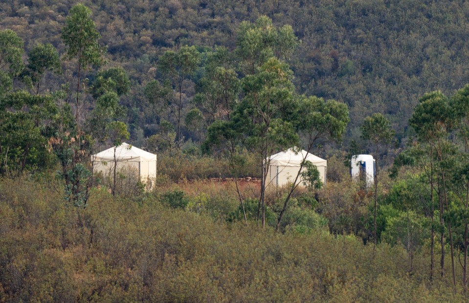 Two white tents have been erected