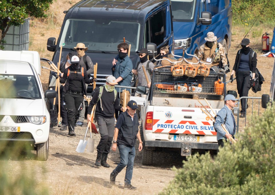 Balaclava-clad search teams scraped and scoured the land around the reservoir