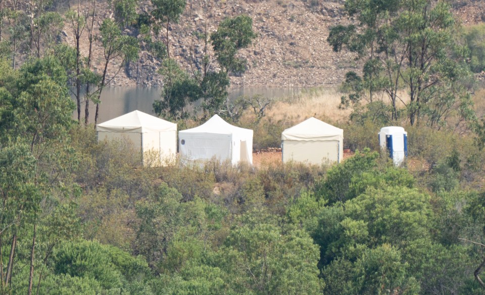 White tents were seen at the reservoir near Silves, Portugal, today