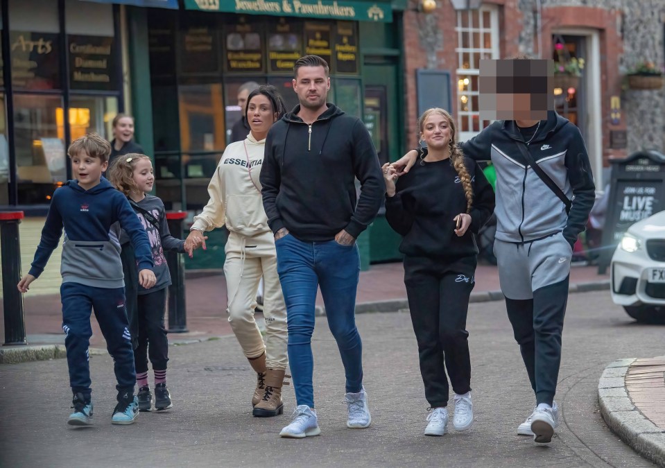 Katie Price strolled with her family towards the car park