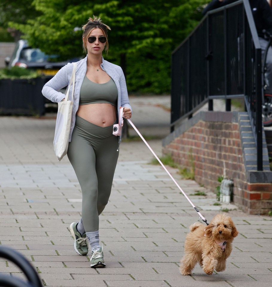 Ferne McCann showed off her bare bump on a dog walk