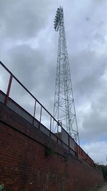 The floodlights still stand tall in the ground