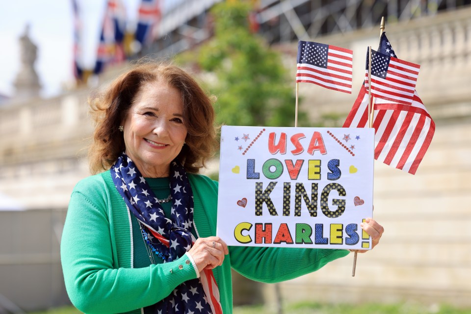 Christine Wofford from Canton, Michigan, was carrying a ‘USA loves King Charles’ sign