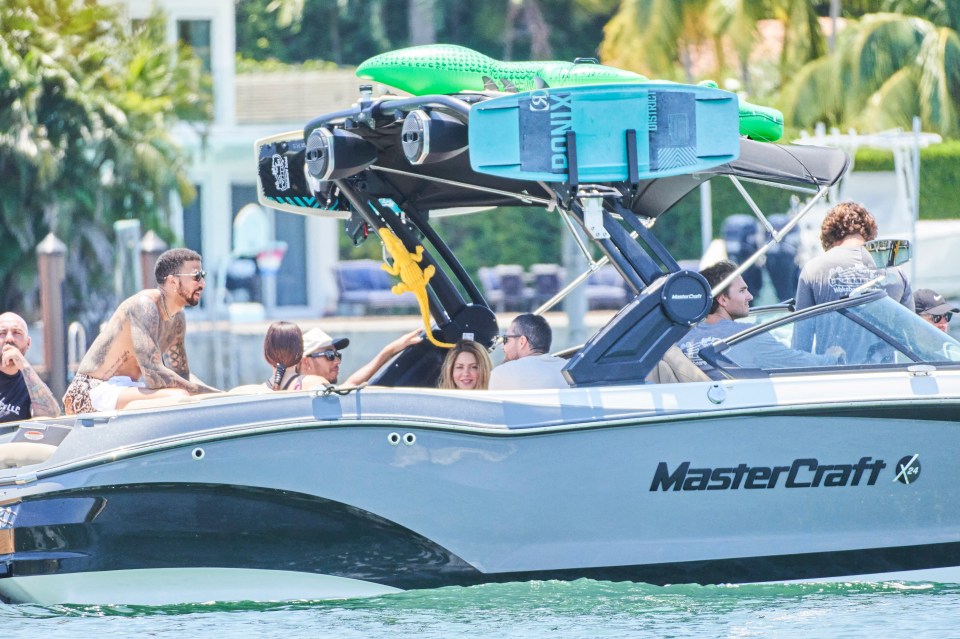 Lewis and Shakira are seen together on the boat