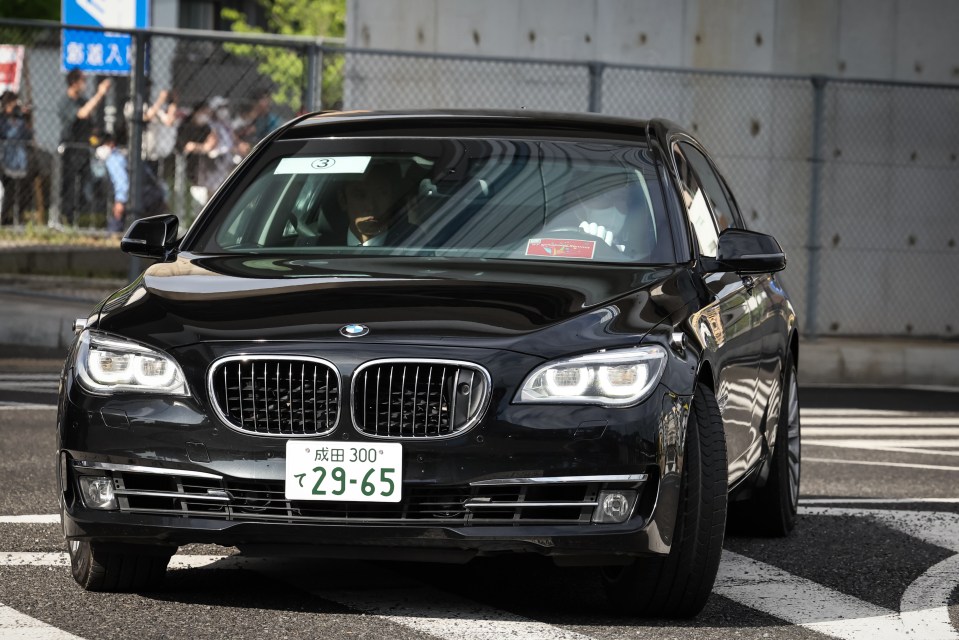 Zelensky travelled in a black BMW as he arrived in Japan