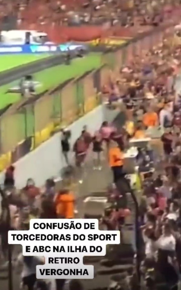 Dozens of women in Recife colours ran to join in