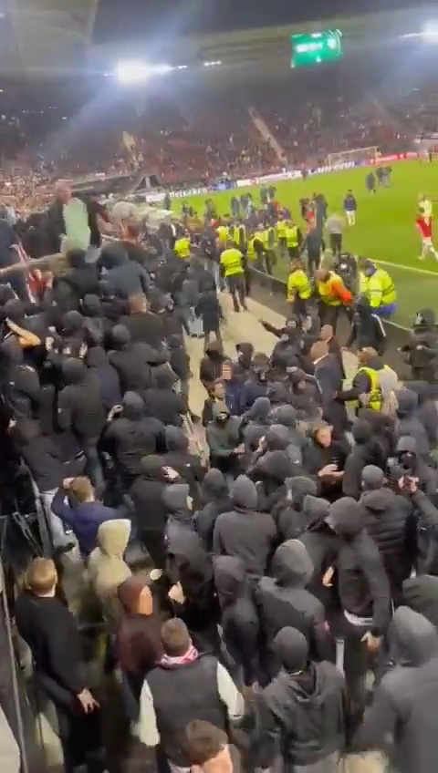 One West Ham supporter fought off the thugs as they tried to get up stairs towards the away end