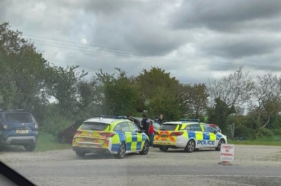 Police had to smash the windows of a car after a crying baby was found locked inside