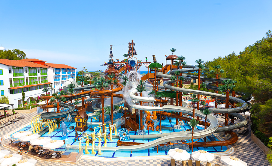 a water park with a pirate ship on top of it