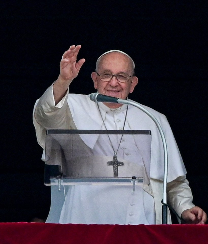 Pope Francis waves during the weekly Angelus prayer on June 4 in the Vatican