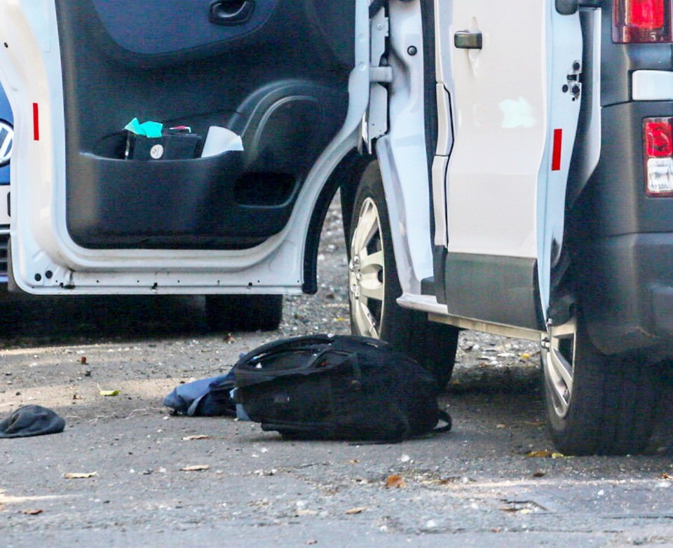 A backpack was pictured lying next to the vehicle, which appears to have a damaged bonnet, and the area was cordoned off