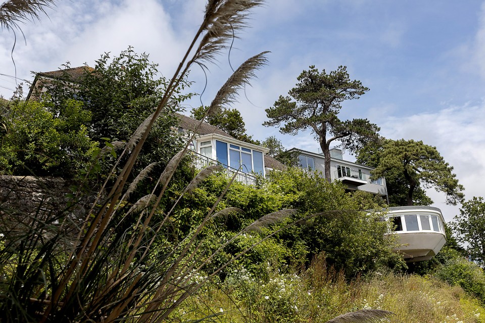 There are proposals to demolish this home, only visible from a side footpath, and rebuild it