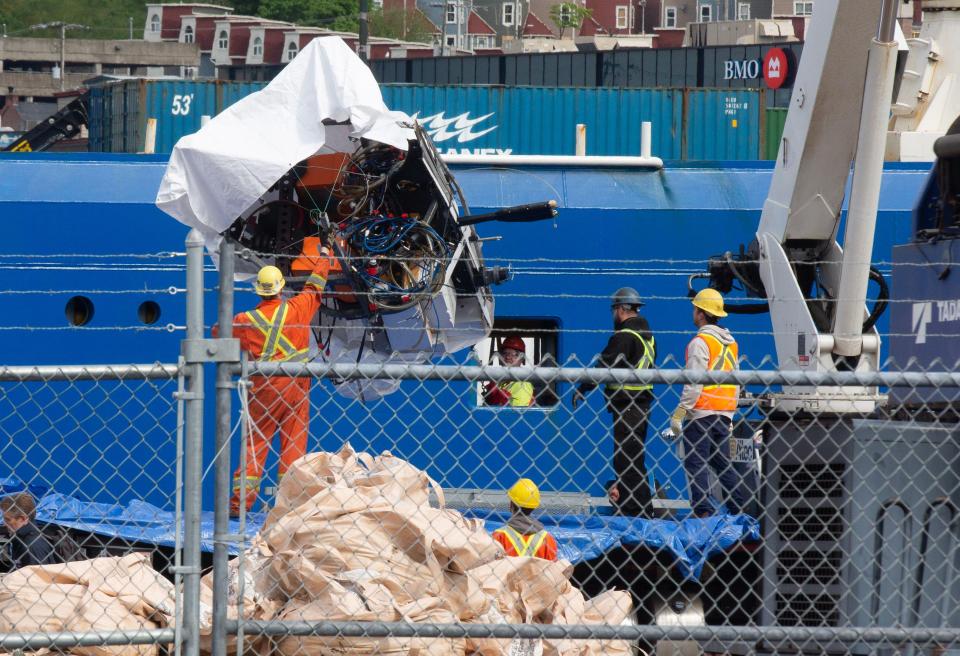 Electrical wiring could be seen underneath the white tarpaulin