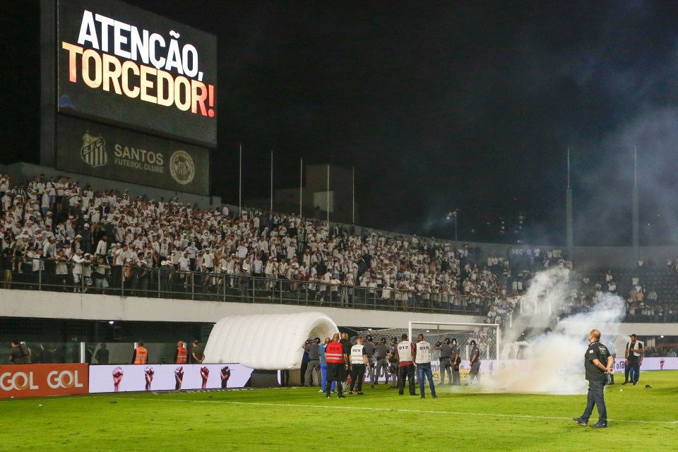 Santos fans threw flares on the pitch