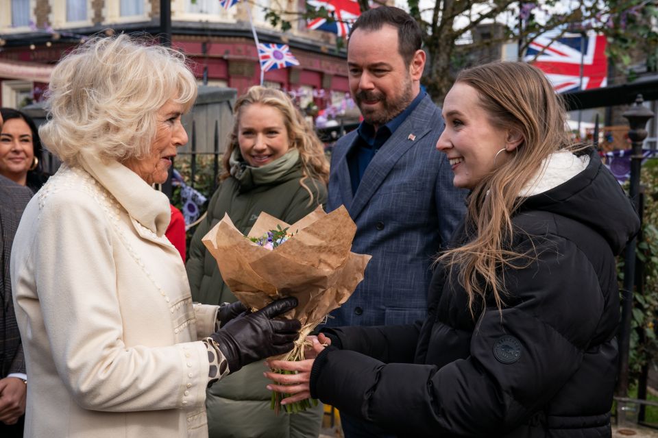 Queen Camilla met Rose Ayling-Ellis and the EastEnder cast during a visit to the set in 2022