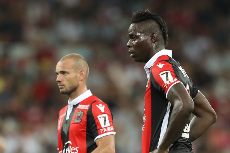 OSWIECIM, POLAND – JUNE 06: (L-R) Mario Balotelli speaks to Wesley Sneijder of Netherlands during a visit by an Italian Football Association (FIGC) delegation to the Auschwitz-Birkenau memorial and former concentration camp, ahead of Euro 2012, on June 6, 2012 in Oswiecim, Poland. (Photo by Claudio Villa/Getty Images)