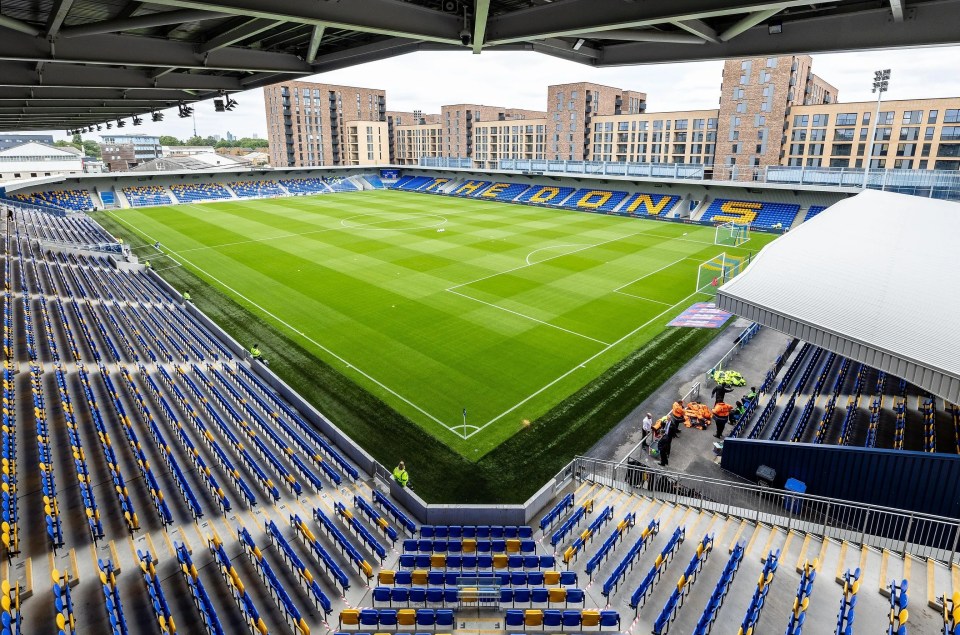 Blocks of flats adjoin the AFC Wimbledon stadium in south west London