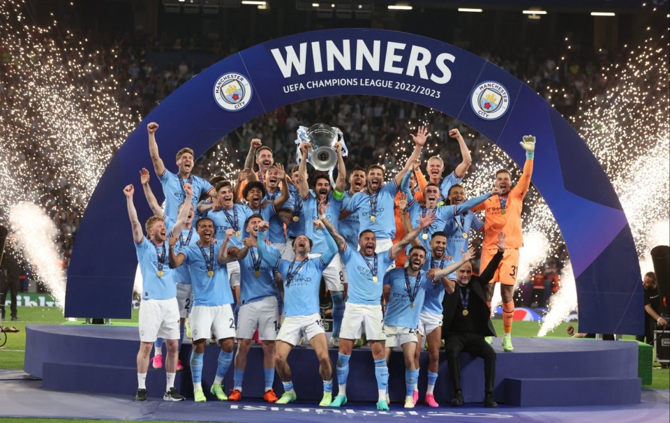 Ilkay Gundogan hoists the Champions League trophy