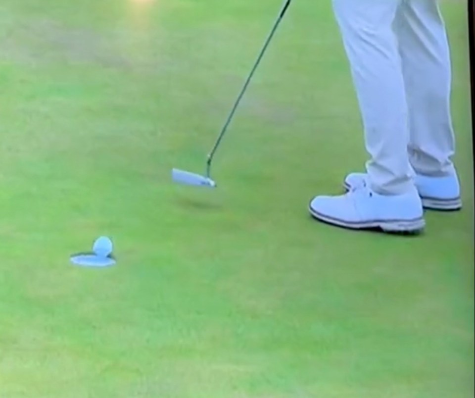 The ball went in the hole before bouncing back out, leaving fans baffled