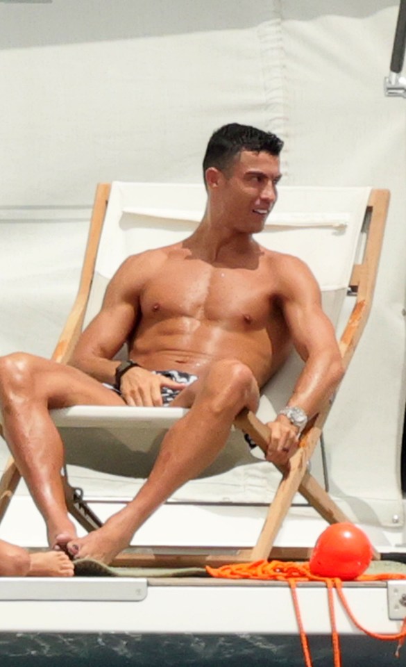 The footballing superstar soaked up the sun on the luxury boat