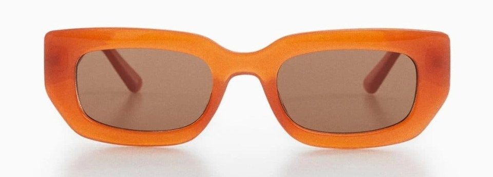 Mango has these orange rectangular sunglasses for £22.99