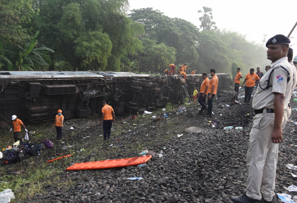 Over 1,200 rescue workers trawled the derailed carriages