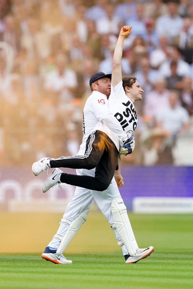 England's Johnny Bairstow was hailed as a hero by PM Rishi Sunak after carrying an eco-activist off the Ashes pitch