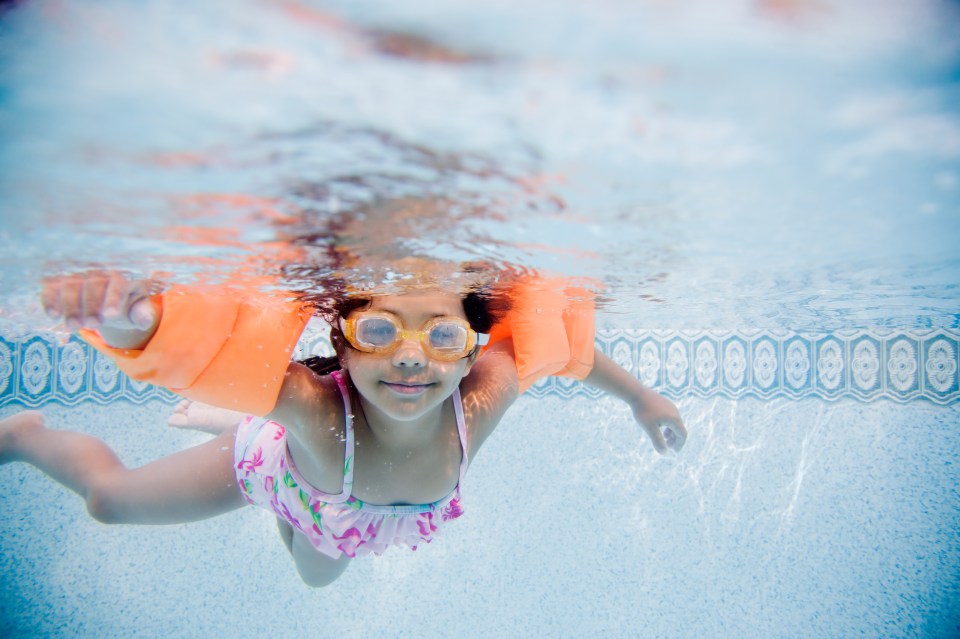 A swimming instructor has warned against the use of pool floats