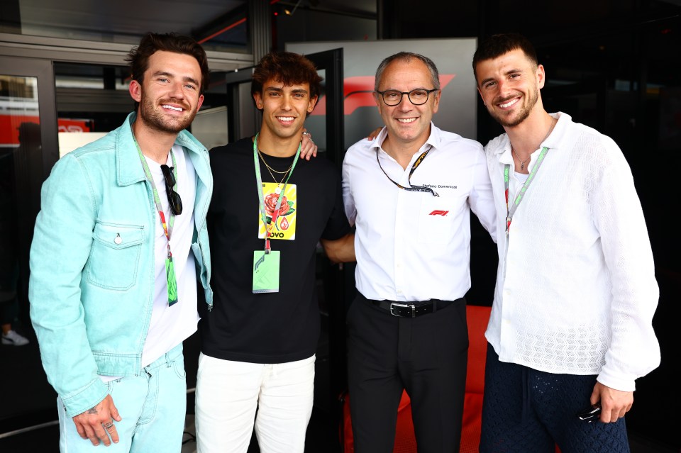 Ben Chilwell, Joao Felix and Mason Mount pose with F1 chief Stefano Domenicali