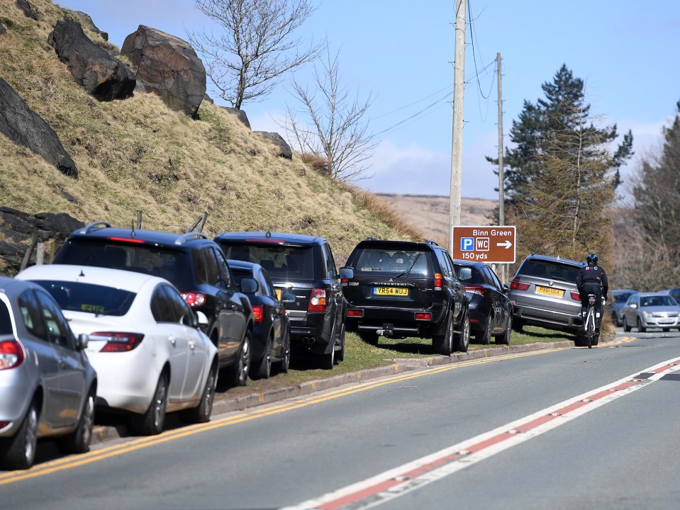 Out-of-towners park illegally on grass verges