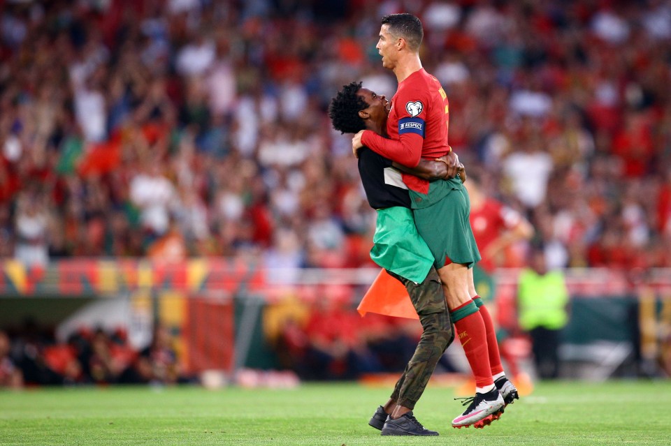 Cristiano Ronaldo was lifted into the air by a pitch invader