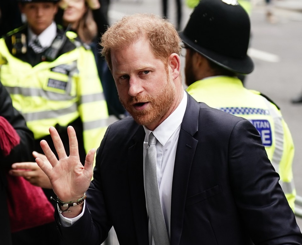 The Duke of Sussex waved as he arrived at court, displaying a selection of bracelets