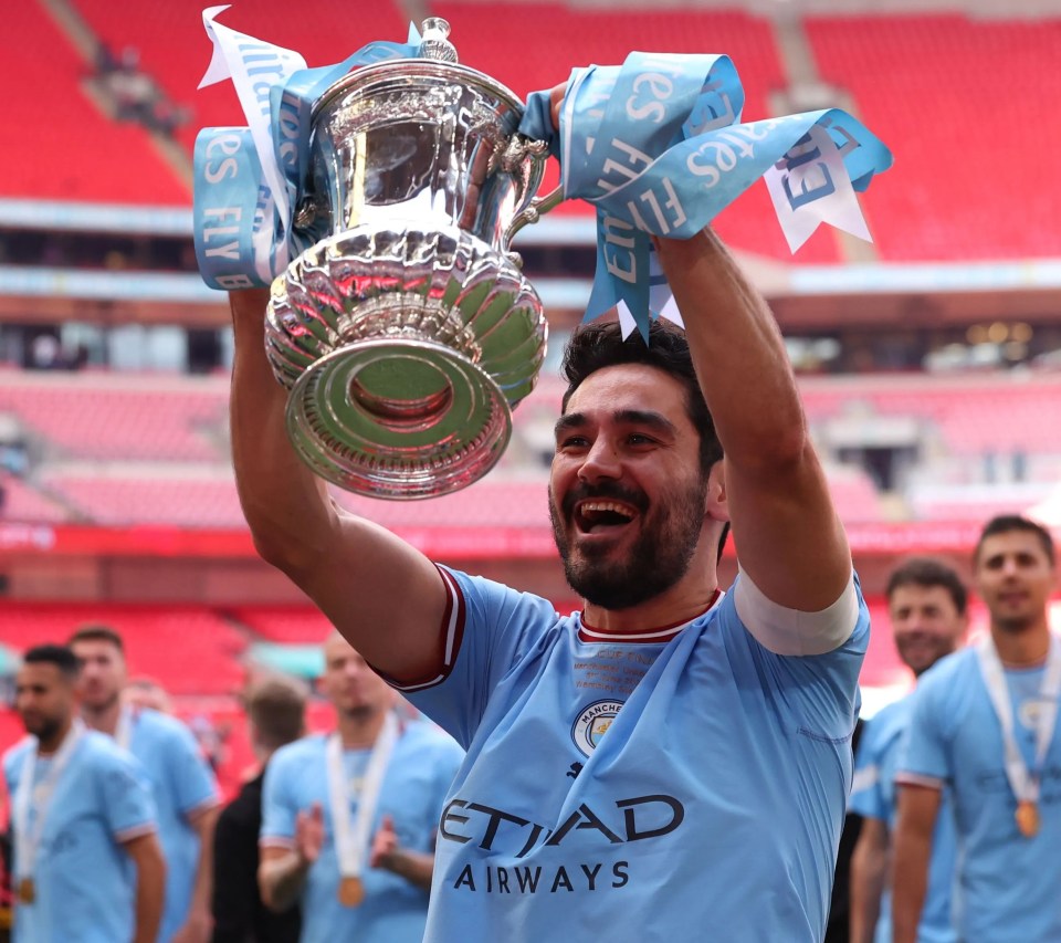 Ilkay Gundogan is spotted lifting the FA Cup without a medal around his neck