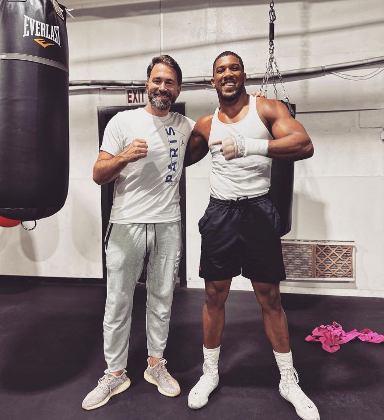 Eddie Hearn pictured with Anthony Joshua