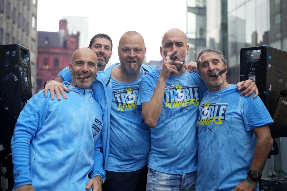 Guardiola posed with some of his backroom staff