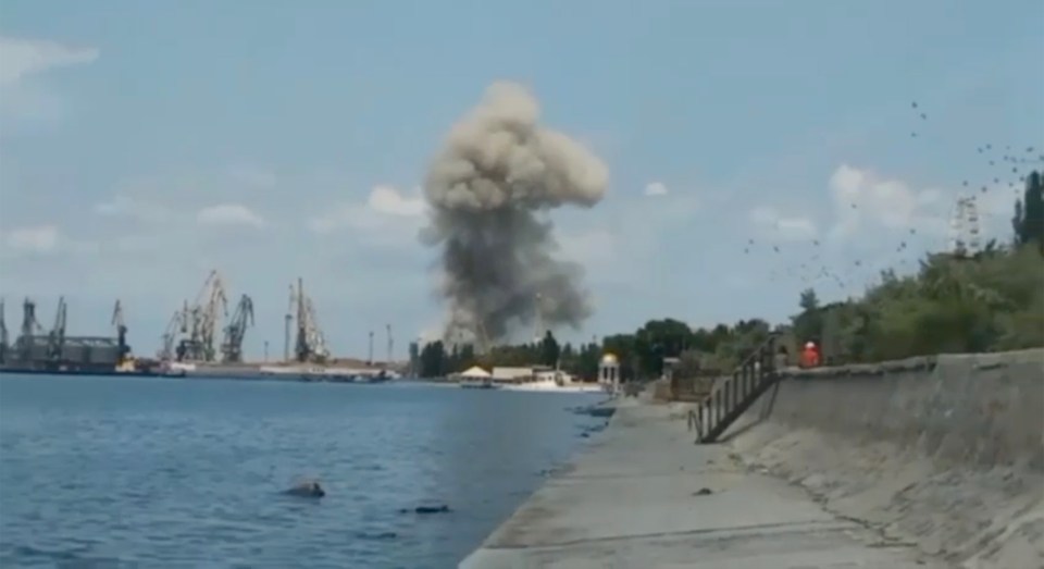 Huge plumes of smoke rise from the scene following a missile strike