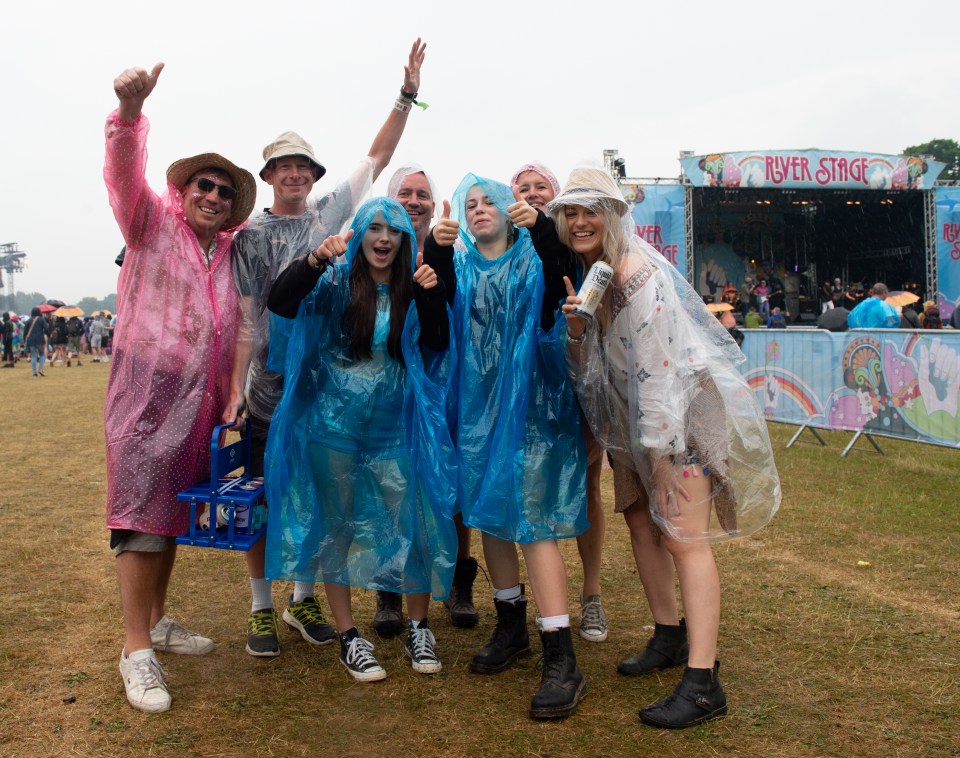 The rain on the Isle of Wight didn't spoil the fun for these festival goers