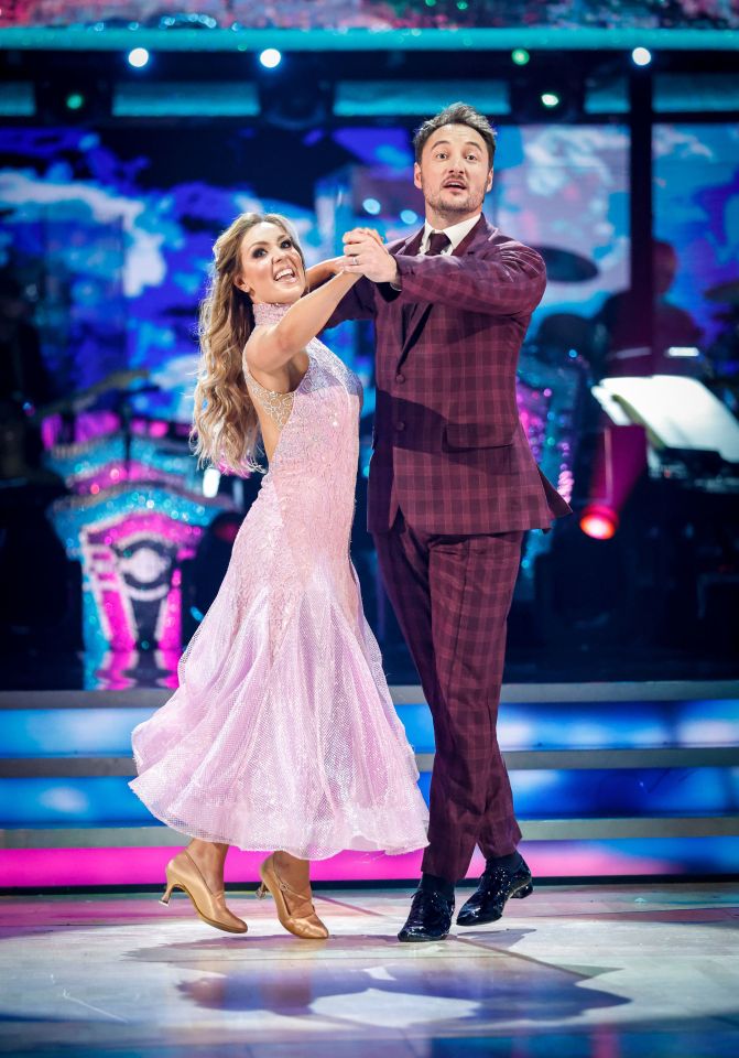 Amy, pictured with her 2022 Strictly partner James Bye, is desperate to get on the dance floor again