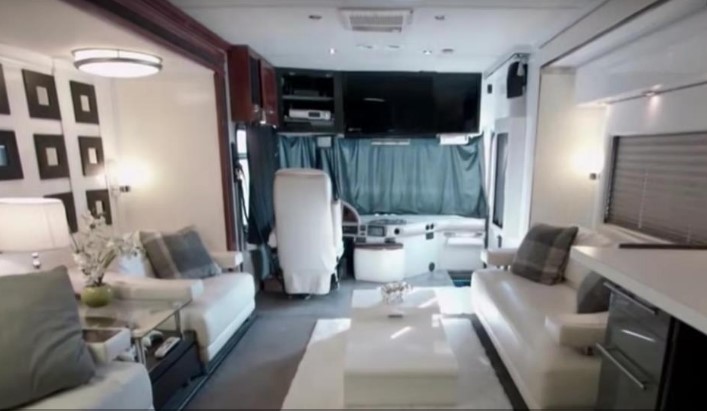 The RV has a wine chiller and larger-than-usual living room area