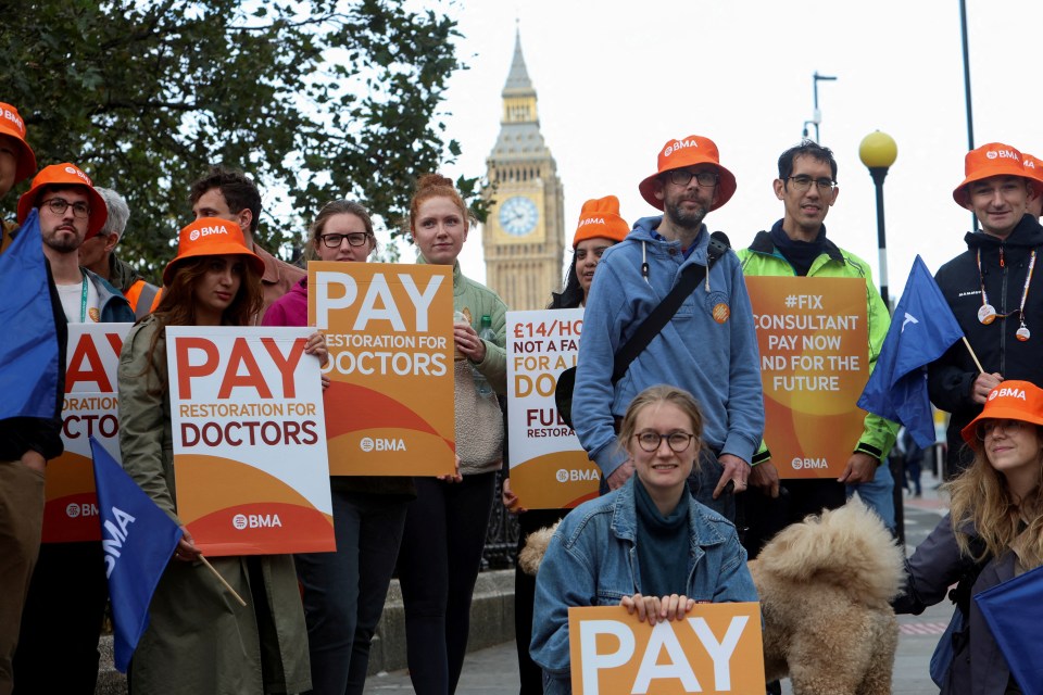 Health workers pictured protesting on a picket line as junior and senior doctors in England take part in a joint strike action in September 2023