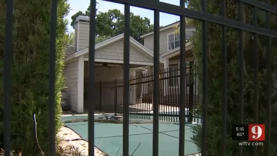 A homeowner at war with his neighbour got his savage revenge by building a fence right through their pool and garage