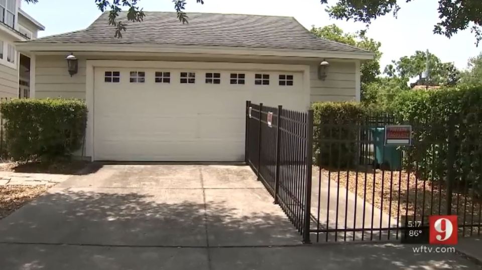 The house owners are firmly fenced-in by their neighbour